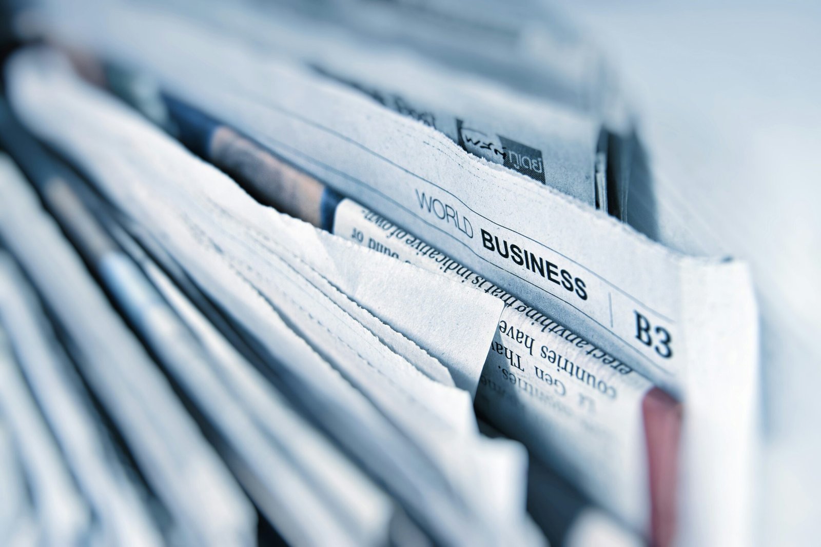 Close-up of a folded World and Business newspaper section